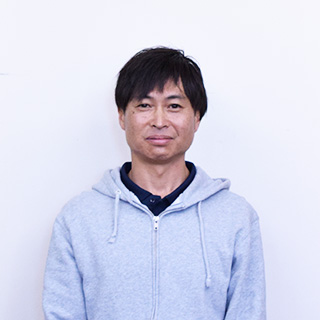 小山 健一